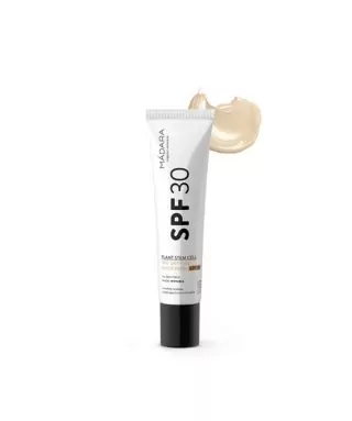 Crème solaire minérale MÁDARA SPF 30, texture teintée nude invisible pour le visage, protection antioxydante UVA/UVB.