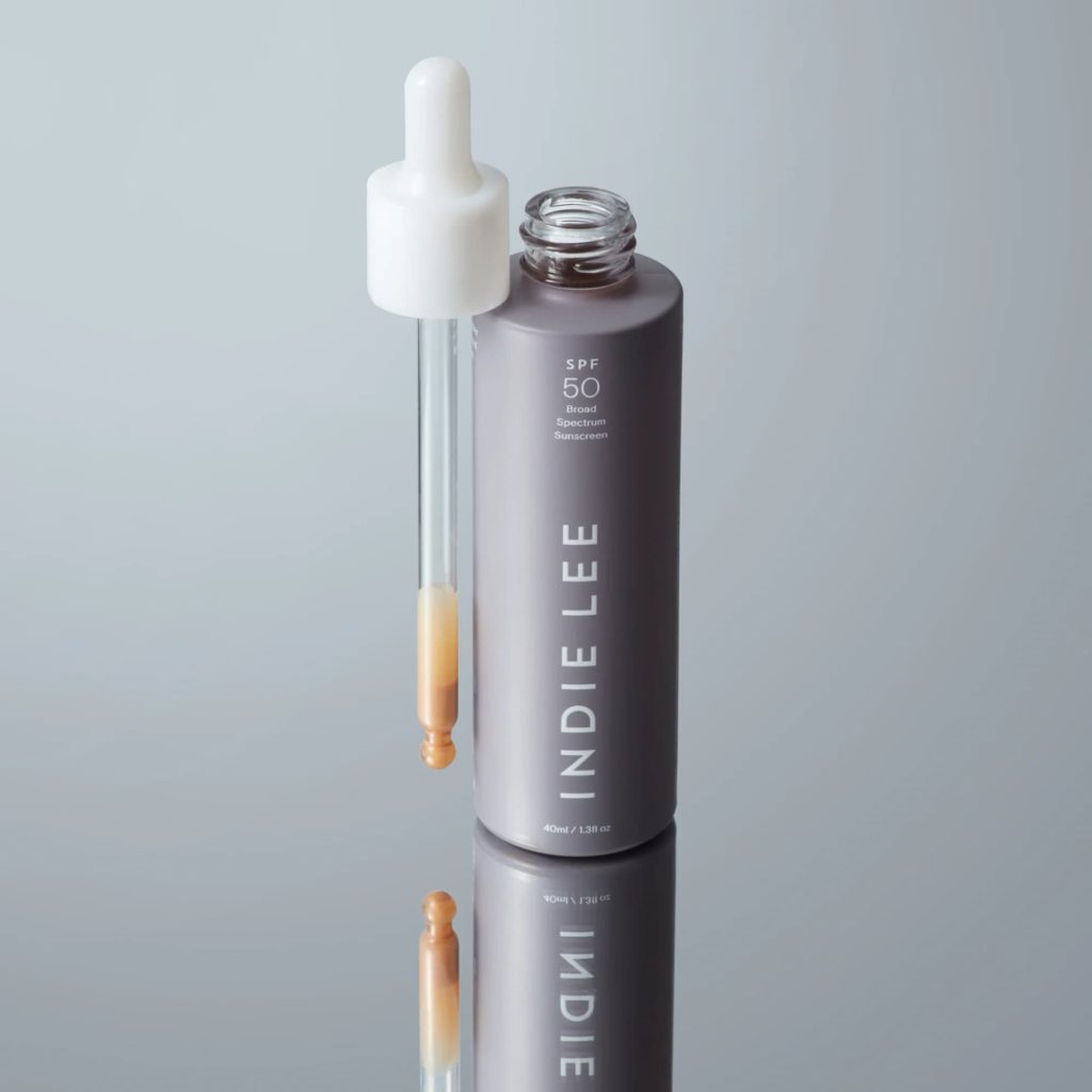 Indie Lee SPF 50 Broad Spectrum Sunscreen dropper bottle 40ml - écran solaire sérum flacon verre pipette, golden serum texture, sunscreen drops face